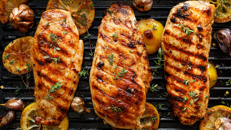 Three grilled chicken breasts